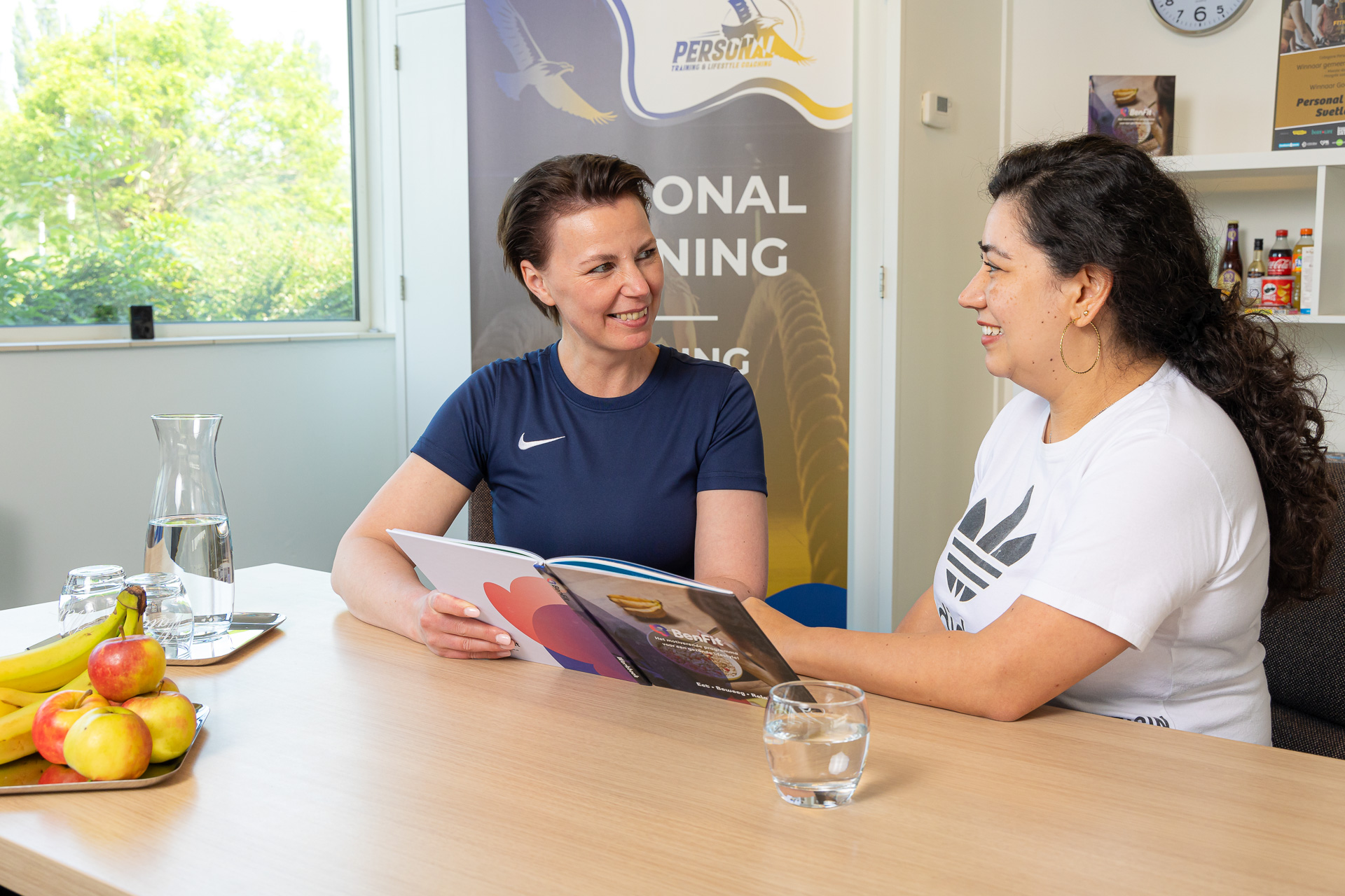 Svetlana begeleidt een klant tijdens een persoonlijk coachingsgesprek